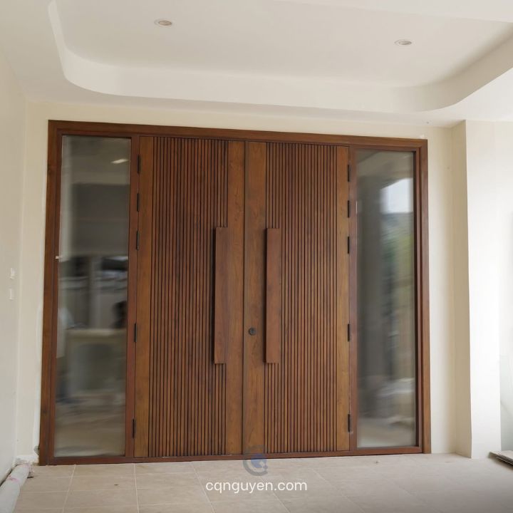 Cửa gỗ 4 cánh lệch đẹp cho mặt tiền