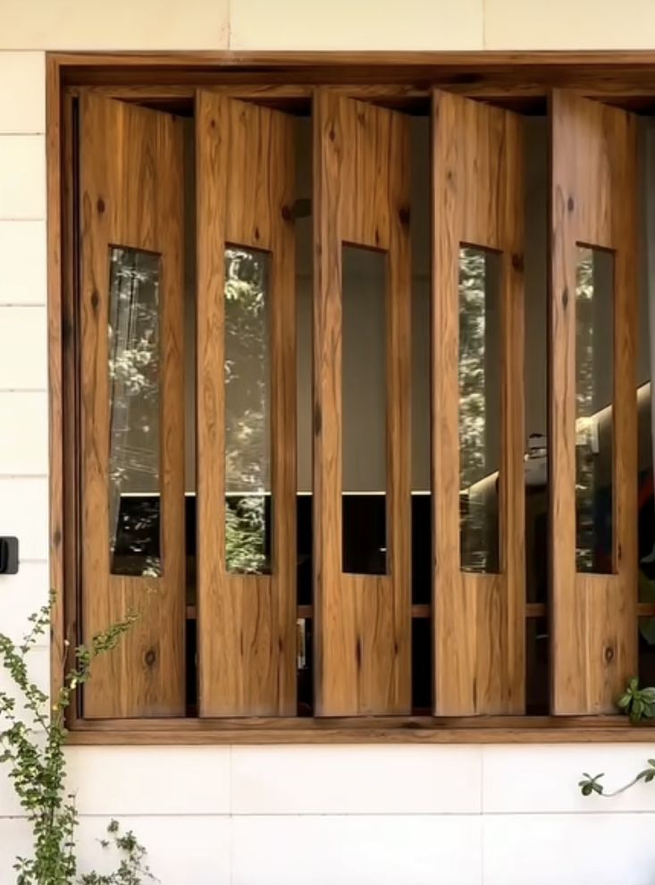 Ứng dụng cửa lá sách gỗ