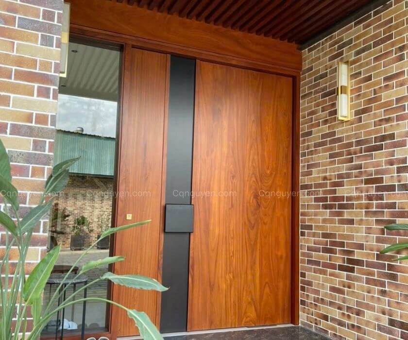 cửa chính gỗ gõ đỏ hiện đại